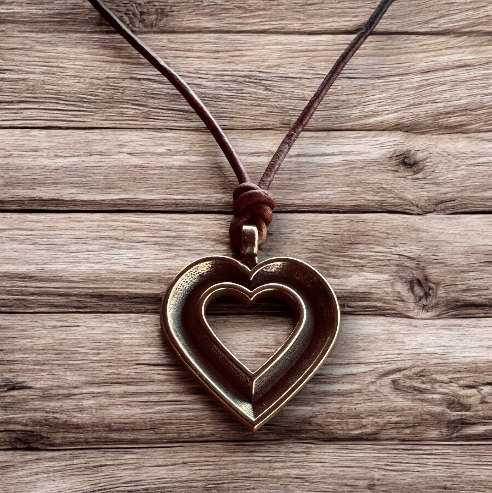 LOVE Heartbeat Necklace - Solid Bronze on Leather Cord